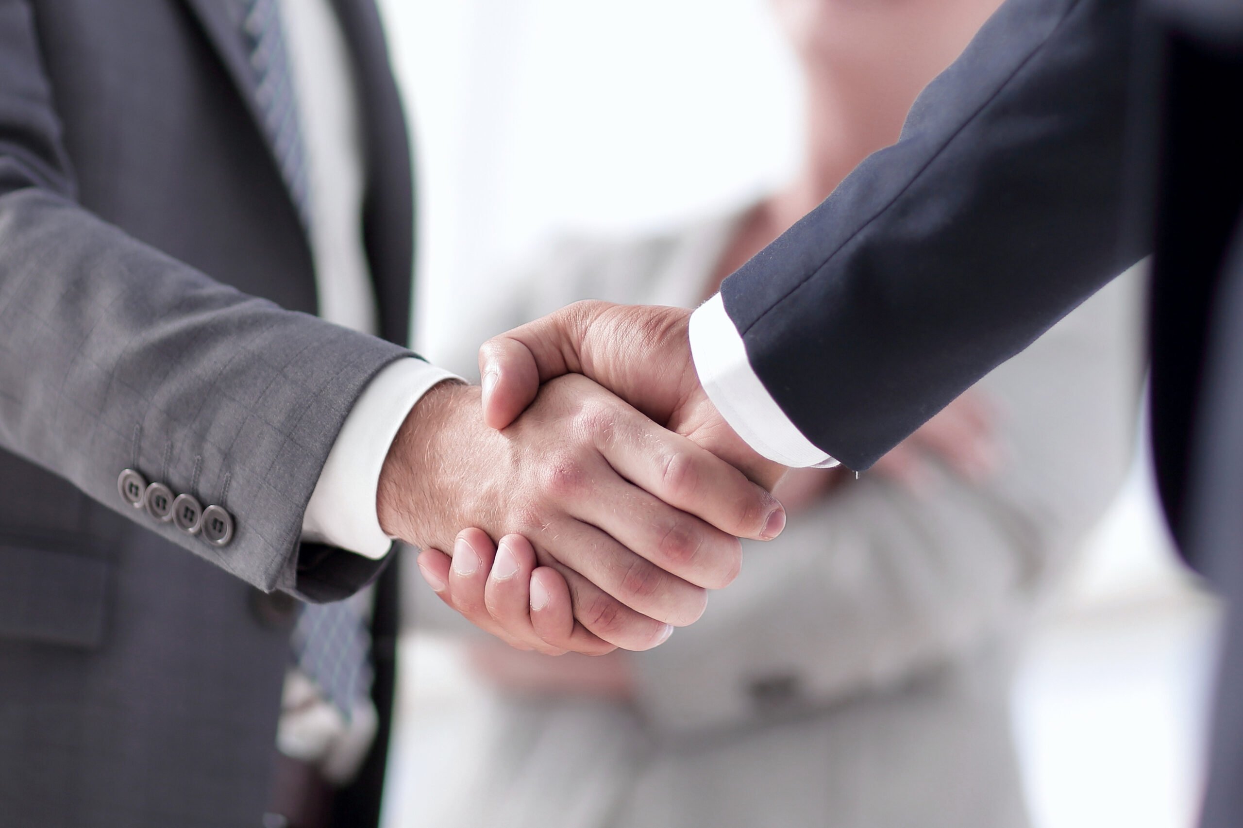 Closeup,Of,Handshake,Of,Business,Partners